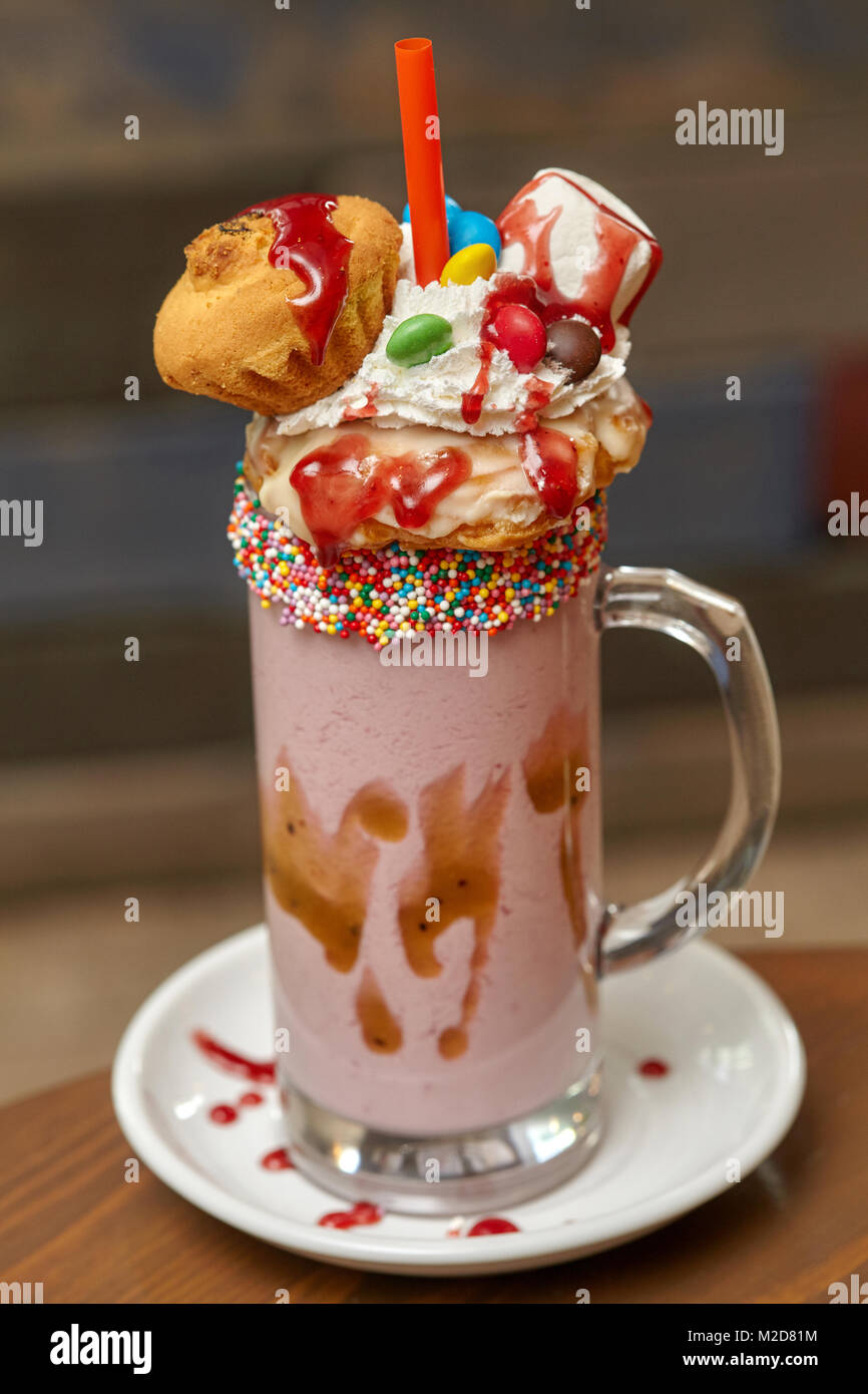 Caramel marshmallow candy milk shake cocktail with whipped cream ...