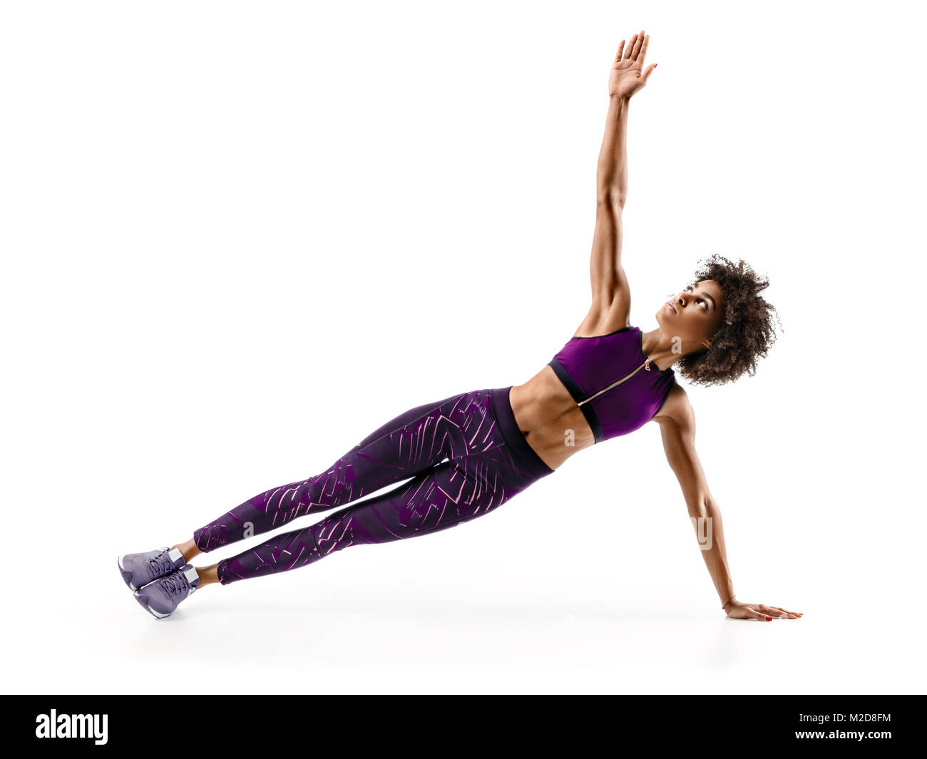 Strong girl doing fitness plank position exercises. Photo of african girl in silhouette on white background. Fitness and healthy lifestyle concept Stock Photo Alamy