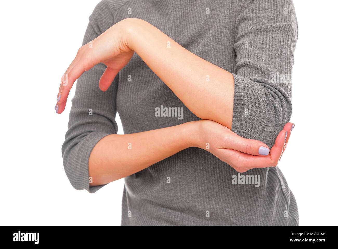 Pain in the elbow. Stock Photo