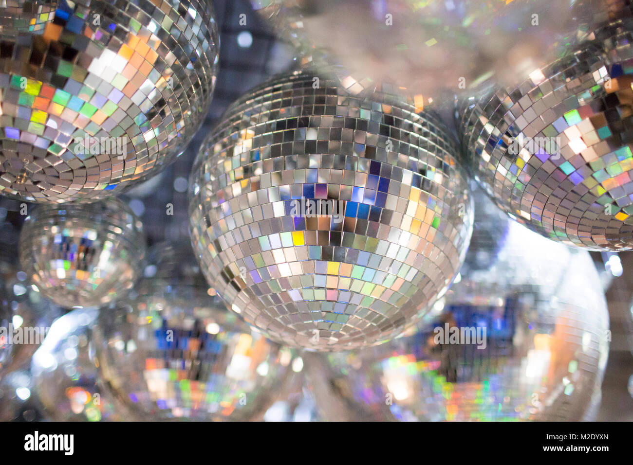 Disco balls on ceiling Stock Photo
