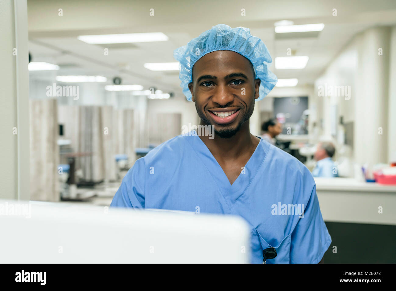 Portrait of smiling Black doctor in hospital Stock Photo