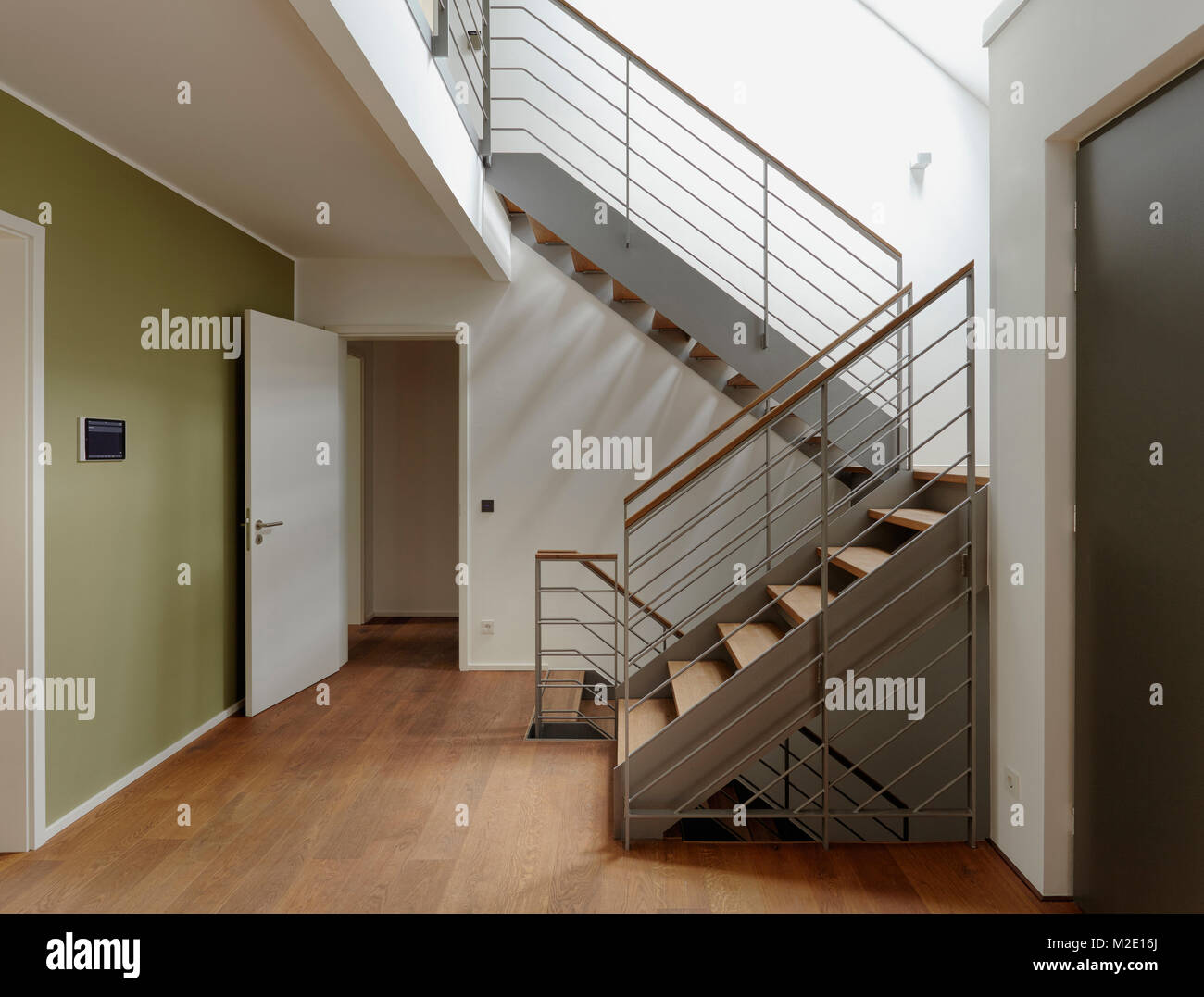 Plank floor and staircase in home Stock Photo