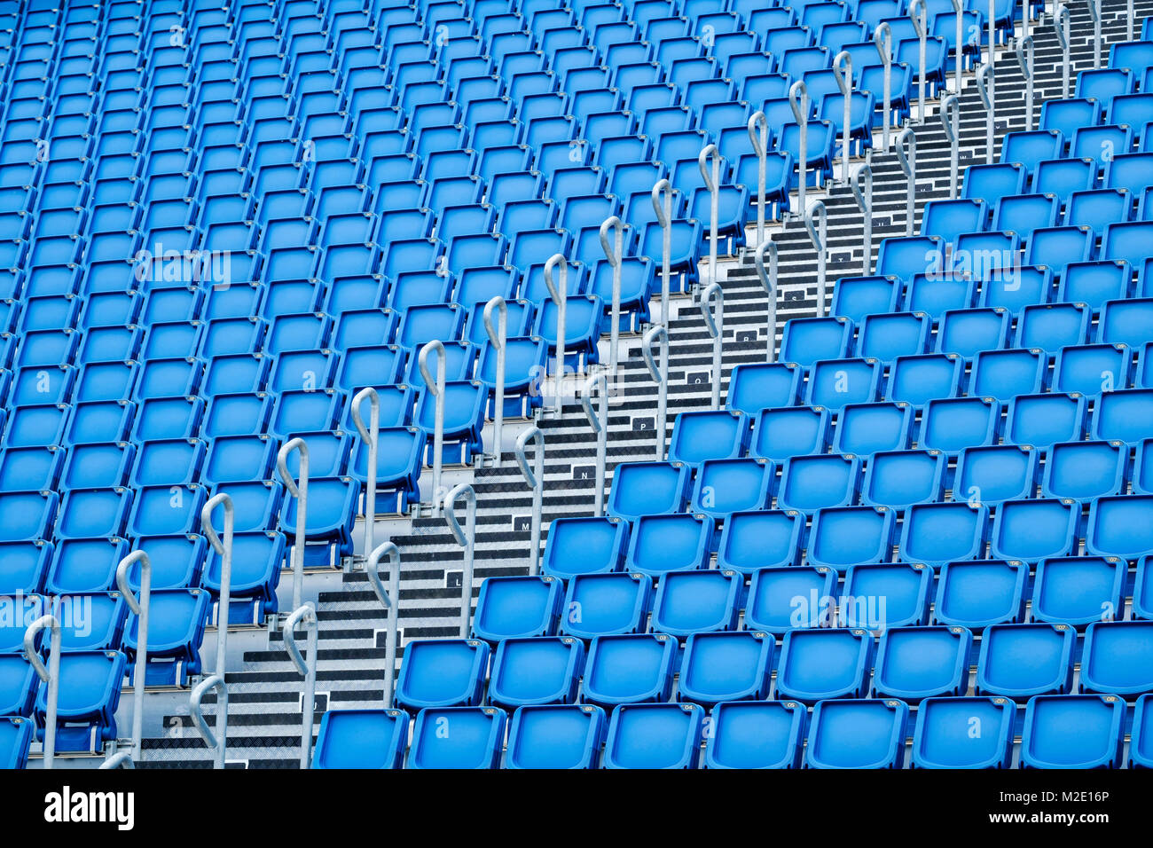 Blue seats in stadium Stock Photo