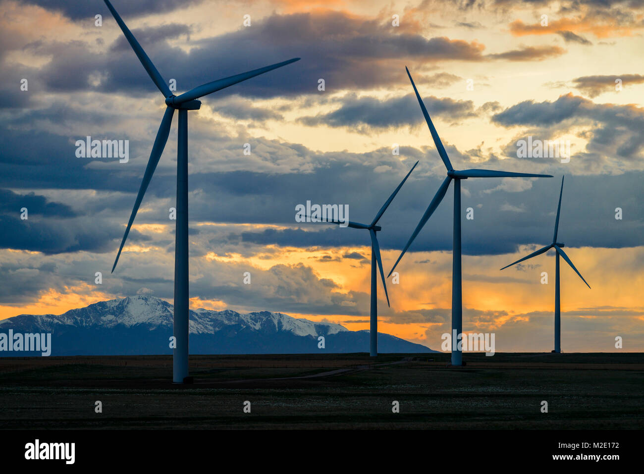 Wind turbines at sunset Stock Photo