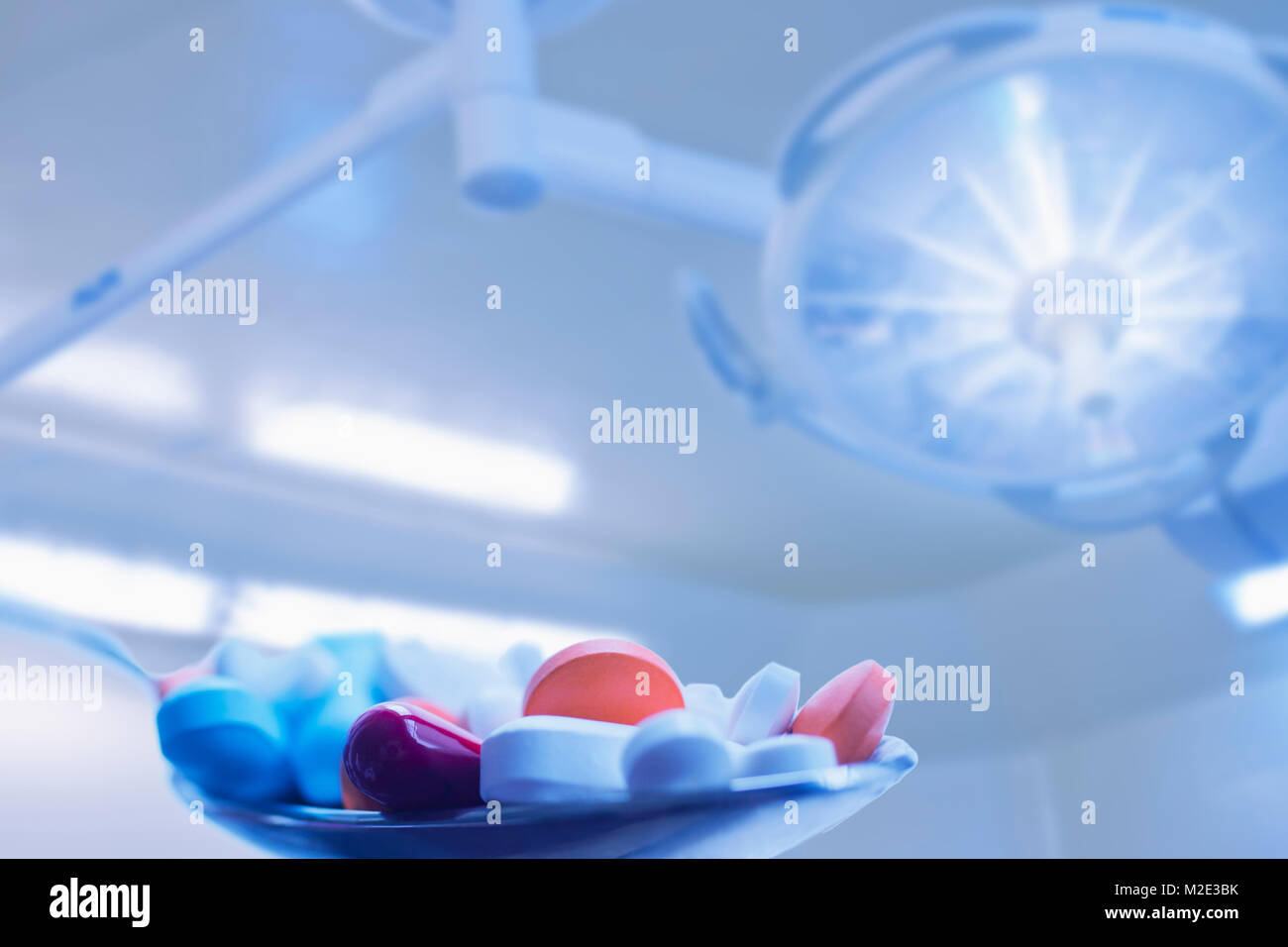 Close up of pharmaceutical pills in spoon Stock Photo