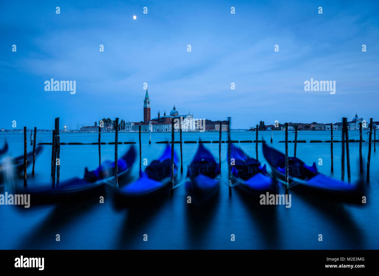 Blue gondolas at night Stock Photo