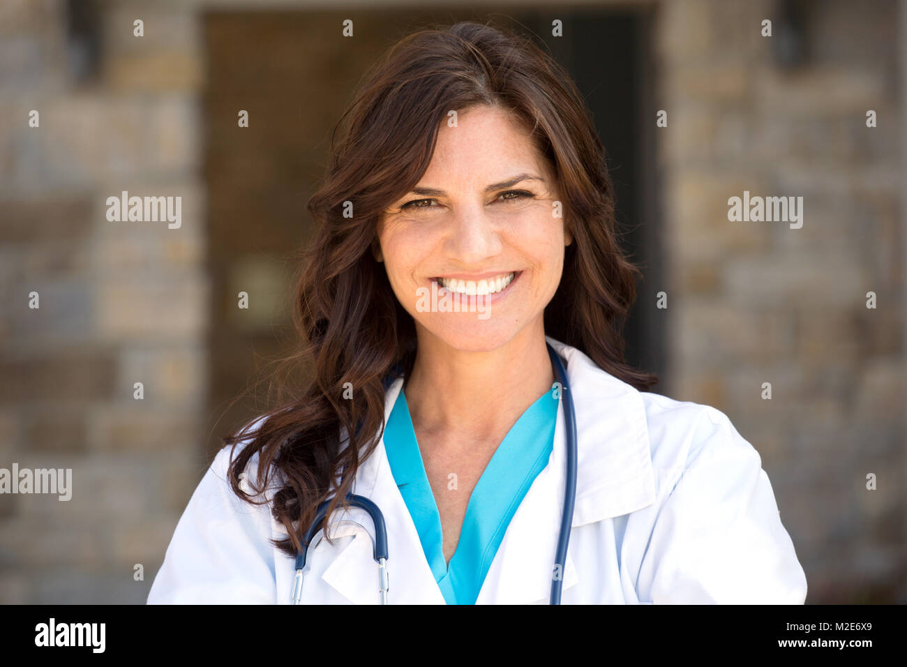 Healthcare worker standing outside the hospital. Stock Photo