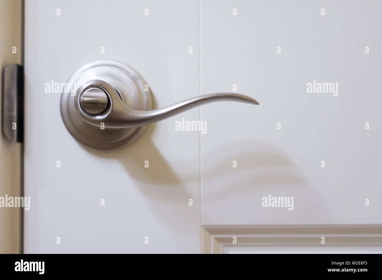 Silver door handle Stock Photo Alamy