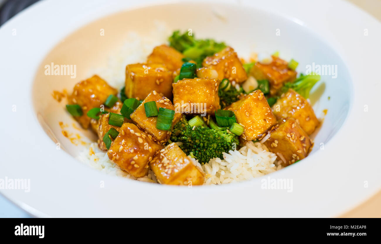 Chili honey tofu with rice and broccoli Stock Photo Alamy
