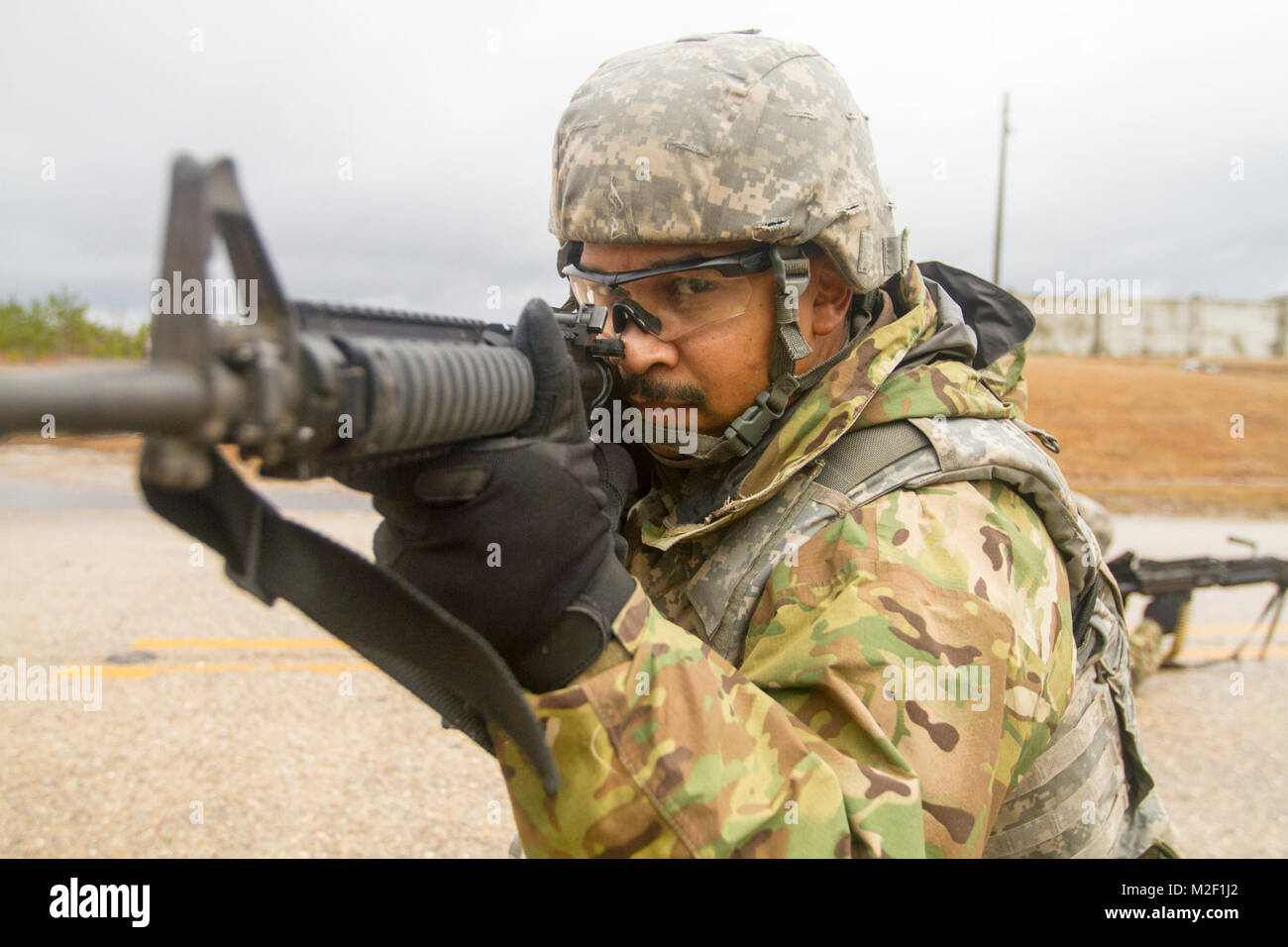 Mississippi Army National Guard Sgt. Bryan Husband, an intelligence analyst assigned to Company D, 150th Engineer Battalion, 155th Armored Brigade Combat Team, pulls security during in an entry control point training exercise at Camp Shelby Joint Forces Training Center, Miss., Feb. 4, 2018.  The 155th ABCT is training for an upcoming deployment to the Middle East in support of Operation Spartan Shield. (U.S. Army National Guard Stock Photo