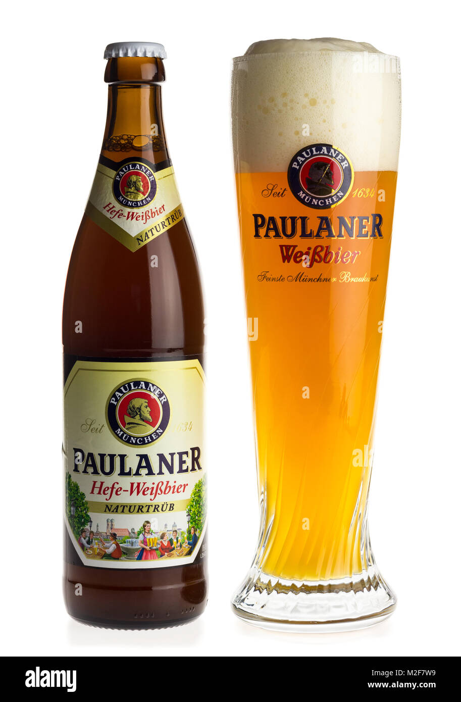 Bottle and glass of German Paulaner light wheat beer isolated on a