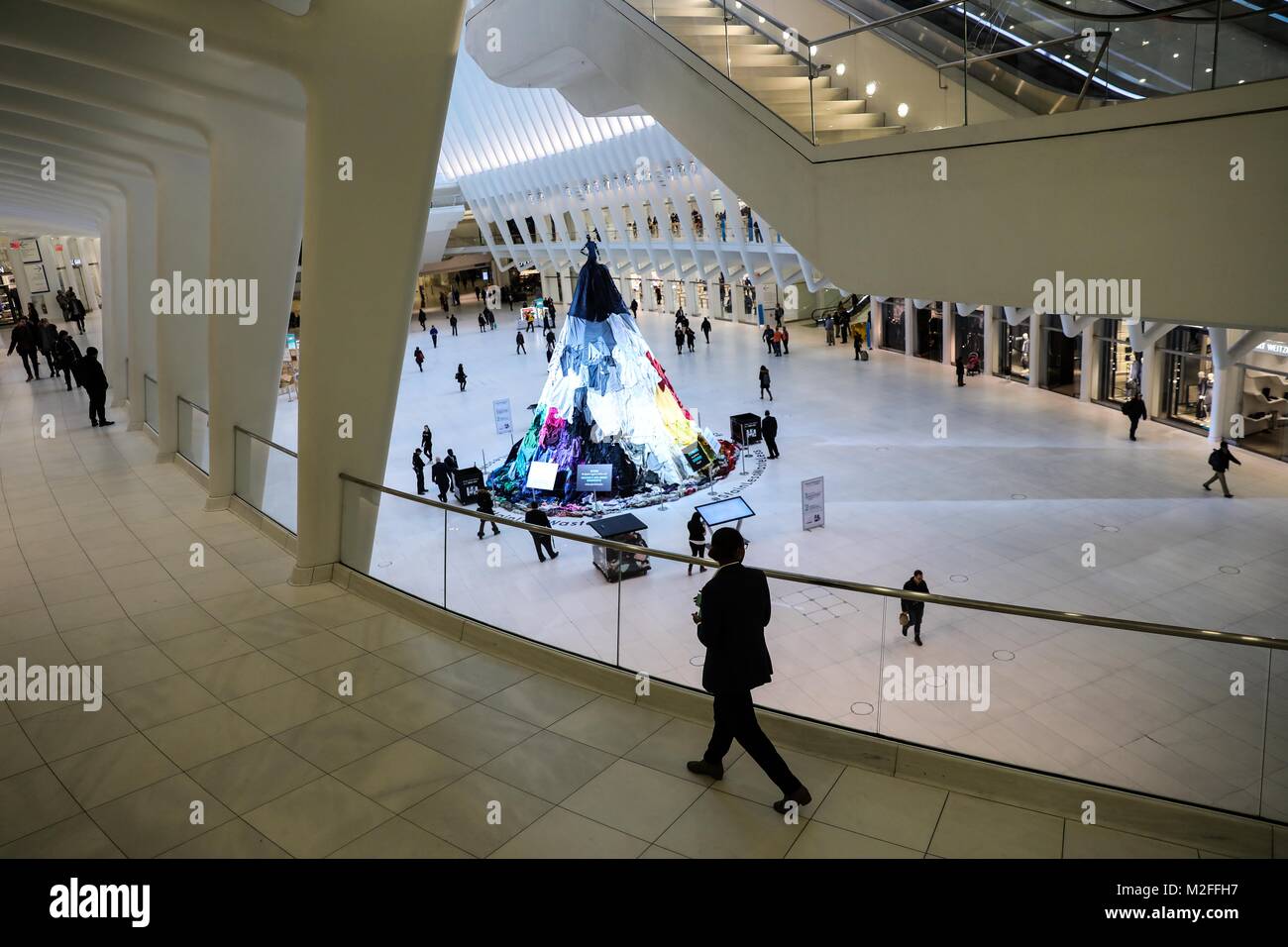 An artistic installation, Stain-Less, Waste-Less, can be seen at The Oculus World Trade Center in Manhattan in New York City on Wednesday, 07. The work calls attention to inform that 10.5 million tons of clothes are discarded every year, and three out of four people are not donating clothes because they are torn or stained. (PHOTO: WILLIAM VOLCOV/BRAZIL PHOTO PRESS) Stock Photo