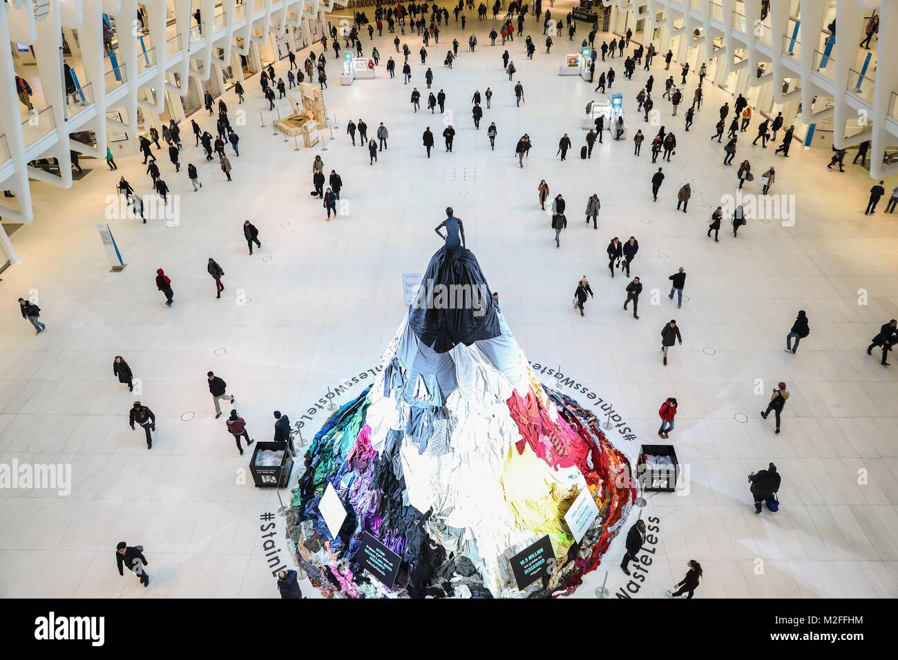 An artistic installation, Stain-Less, Waste-Less, can be seen at The Oculus World Trade Center in Manhattan in New York City on Wednesday, 07. The work calls attention to inform that 10.5 million tons of clothes are discarded every year, and three out of four people are not donating clothes because they are torn or stained. (PHOTO: WILLIAM VOLCOV/BRAZIL PHOTO PRESS) Stock Photo