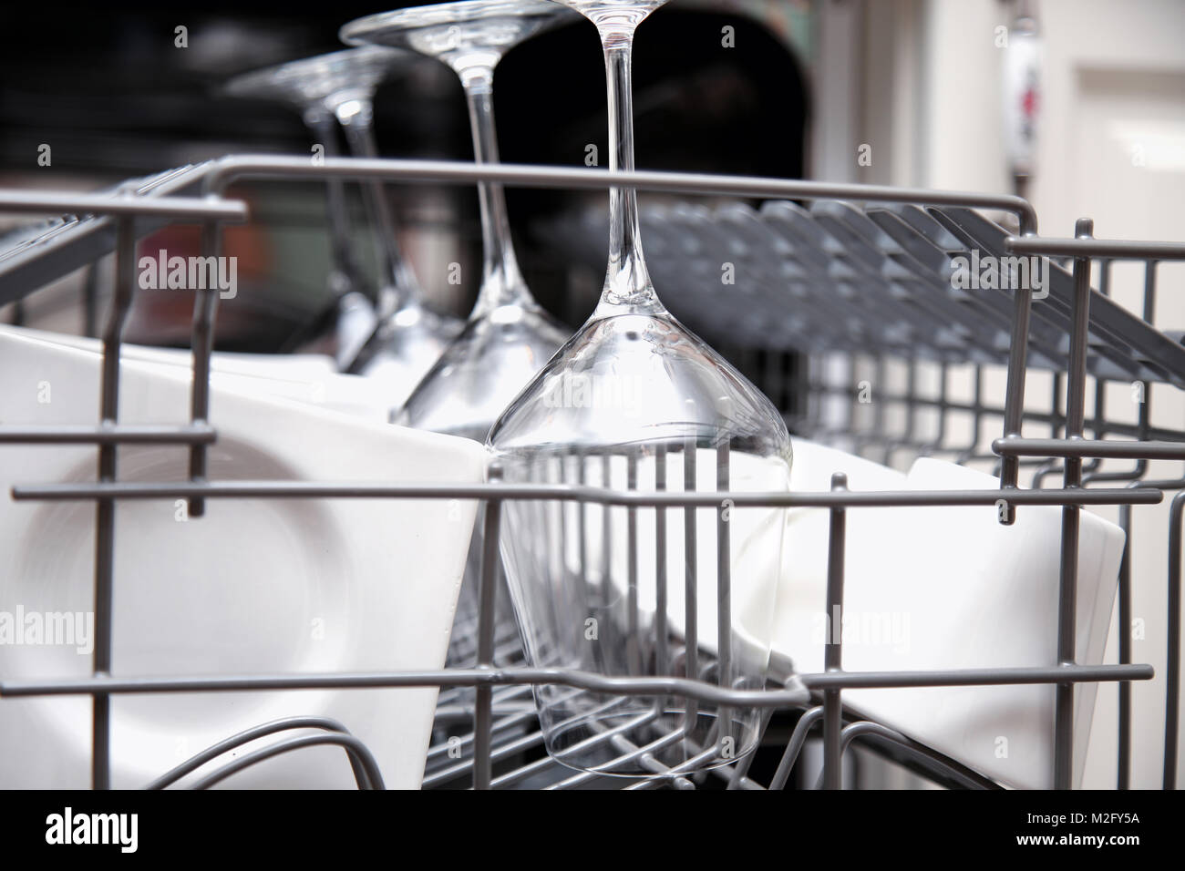 Open dishwasher with clean utensils Stock Photo Alamy