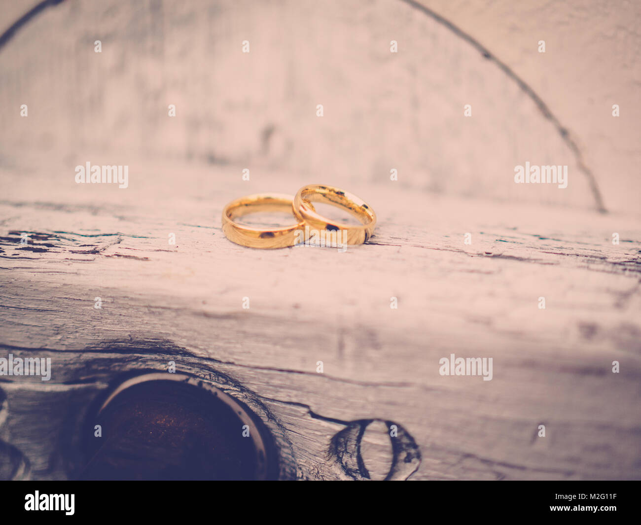 the golden rings on the wood Stock Photo