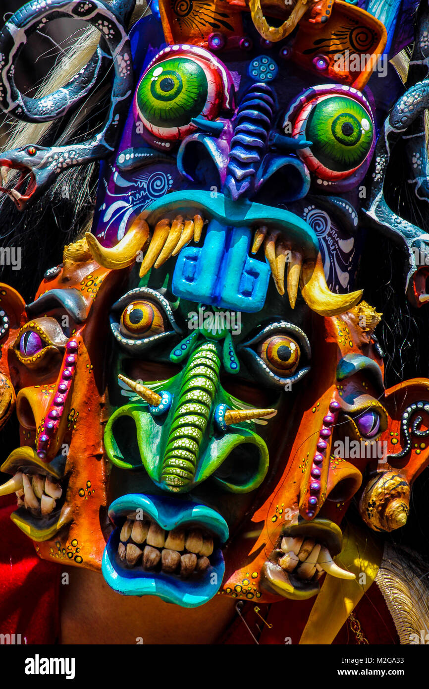 Colorful front look of a 'tastoan' warrior mask at a traditional mexican festival Stock Photo