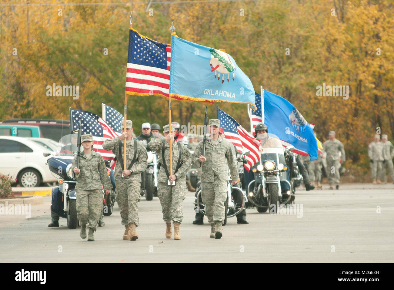 Members of the Oklahoma State University ROTC step off to begin the