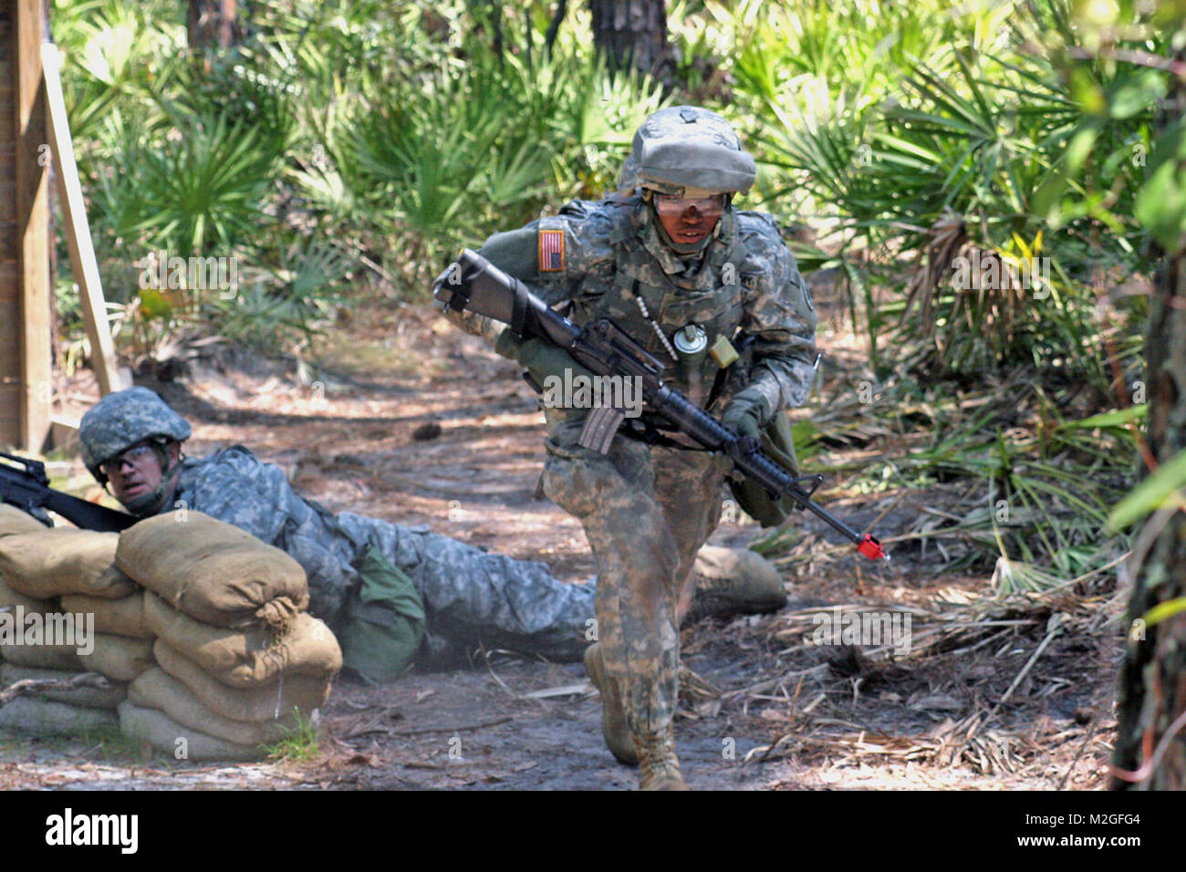 Soldier of the 277th takes off for the next available piece of cover by ...