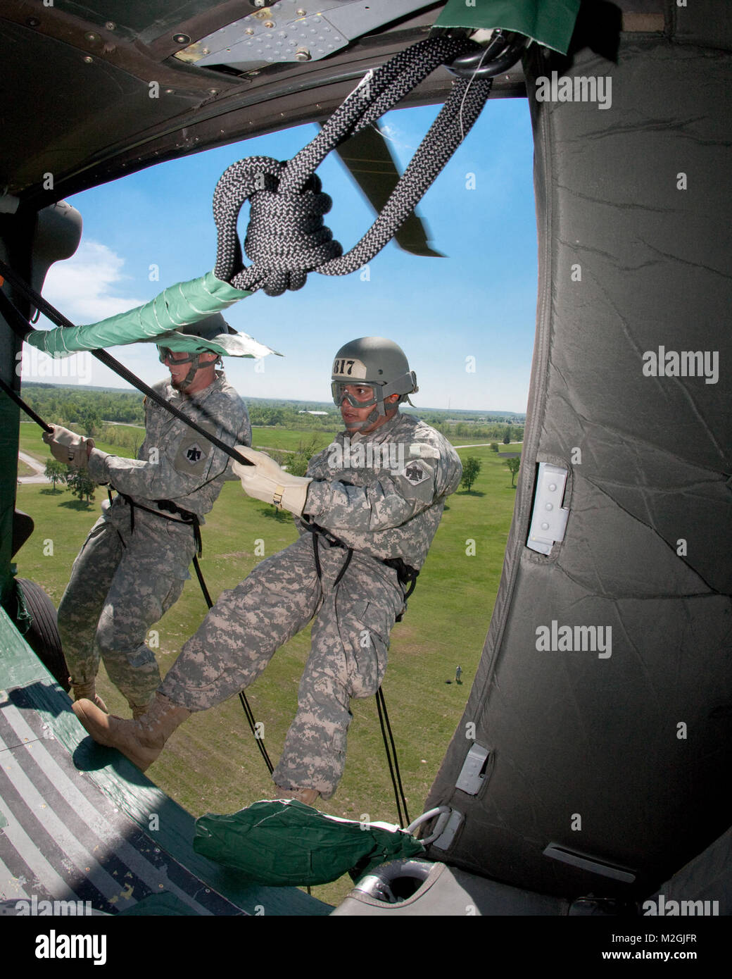 Students in the Army Air Assault School repel from a UH60 helicopter