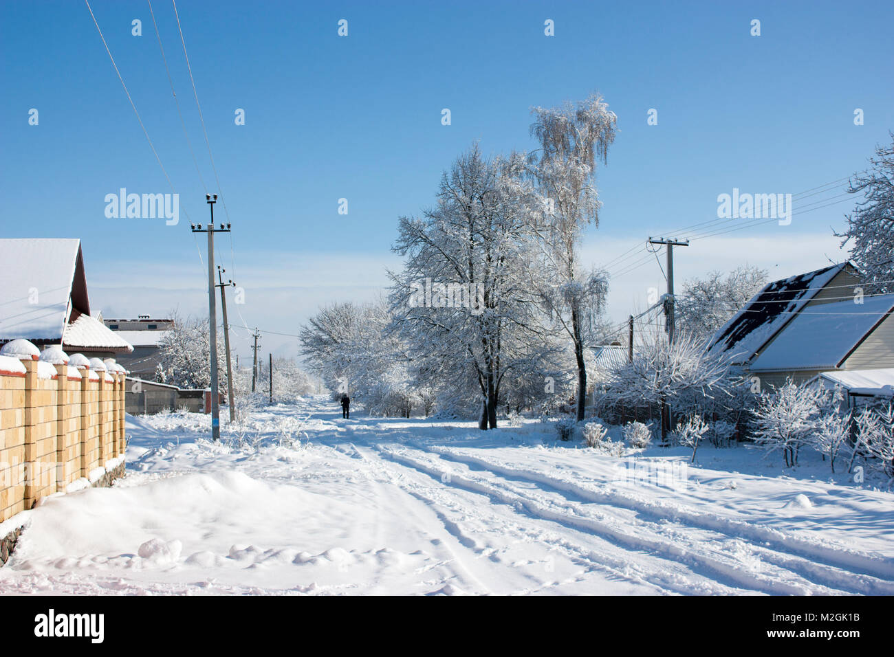 Winter street in the snow, a sunny winter day, at home Stock Photo