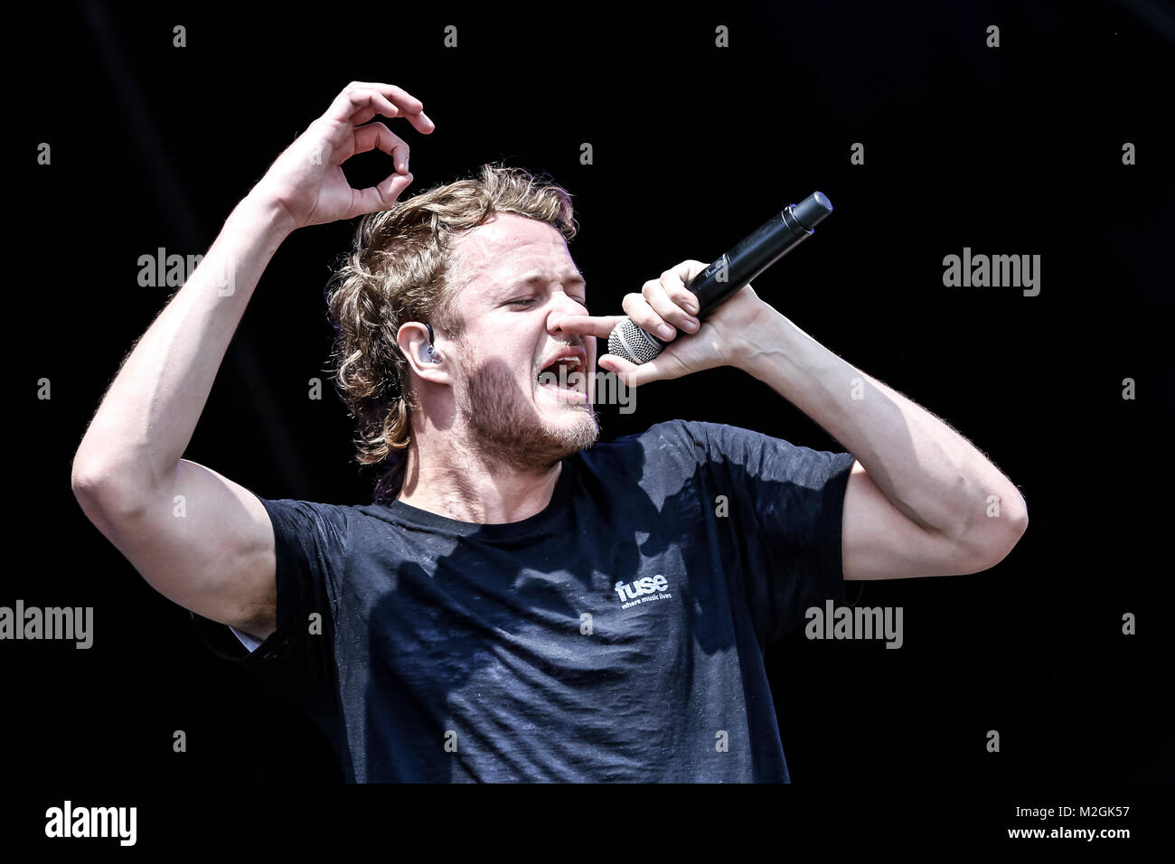 Sänger und Frontmann der Imagine Dragons Dan Reynolds beim Auftritt auf der Centerstage des Rock im Park-Festivals 2013 in Nürnberg. +++ 3S PHOTO / Foto: Sven-Sebastian Sajak Stock Photo