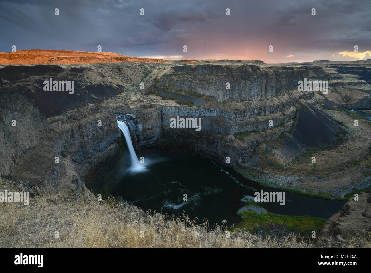 Blurred long exposure of the iconic Palouse Falls state park in Washington state, USA at sunset Stock Photo