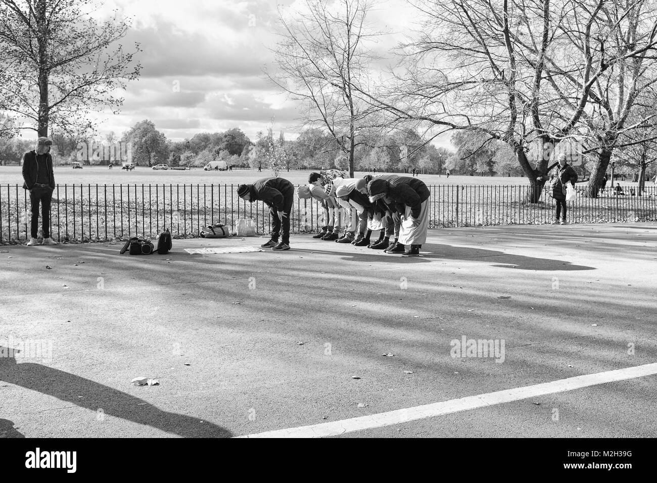 Muslims Praying in Hyde Park, London, England United Kingdom, Credit: London Snapper Stock Photo