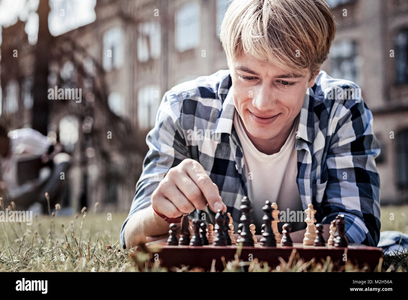 Delighted positive man making a move Stock Photo - Alamy