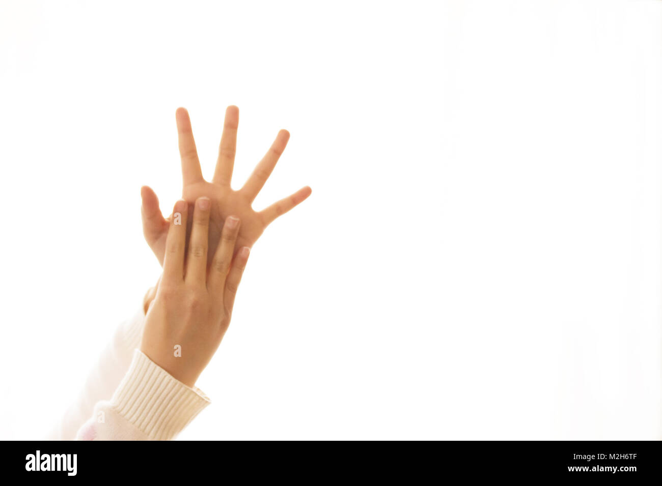 A hand sign indicating the number nine Stock Photo - Alamy