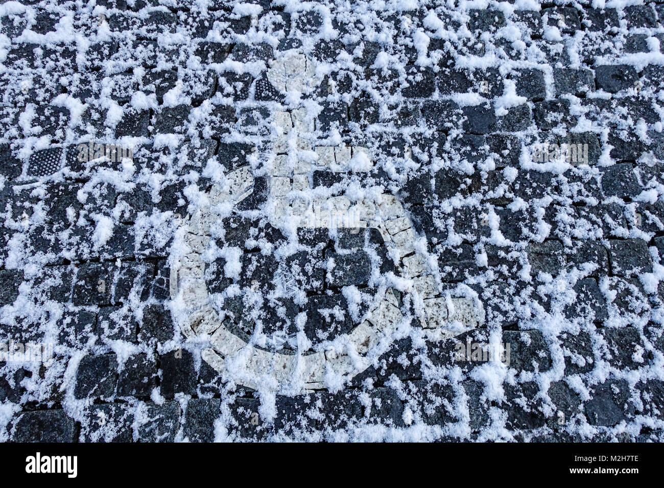 Disabled parking space symbol, snow Stock Photo