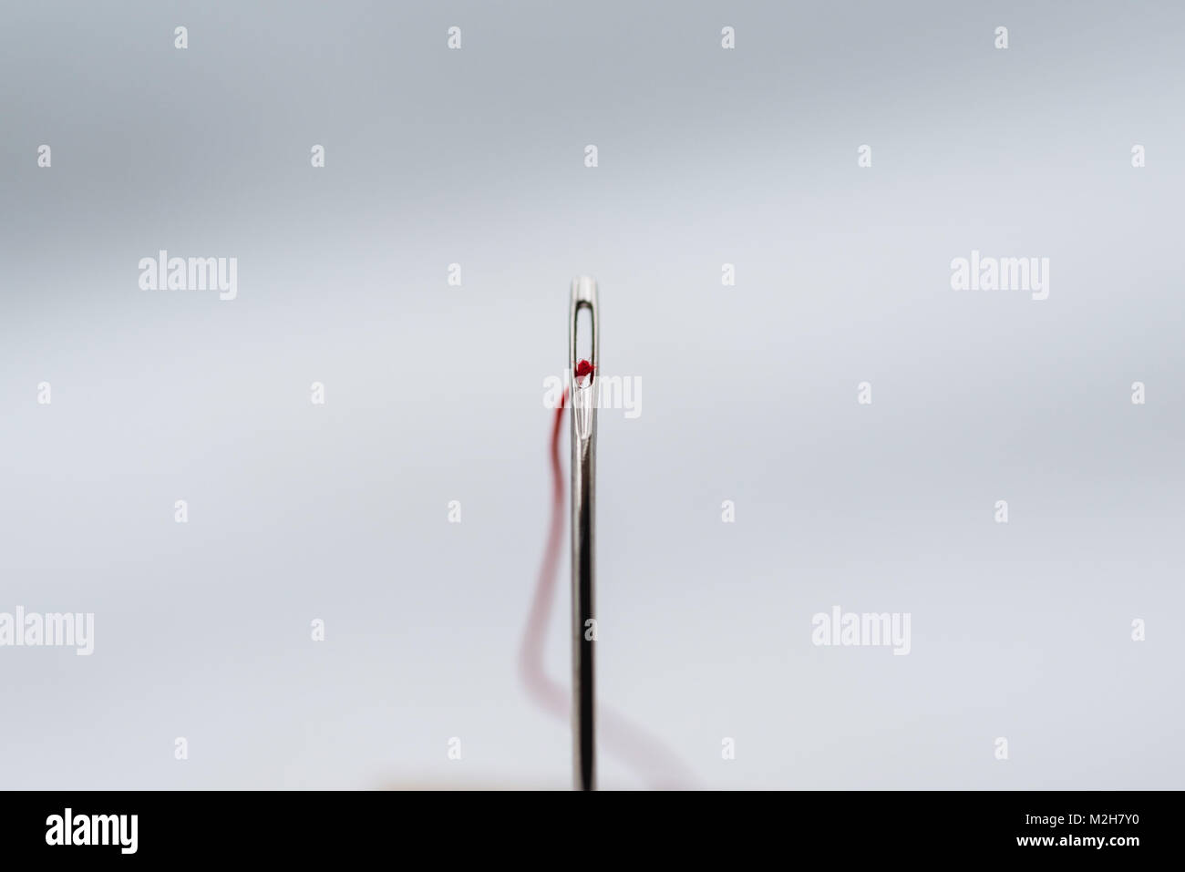 Needle and thread hi-res stock photography and images - Alamy