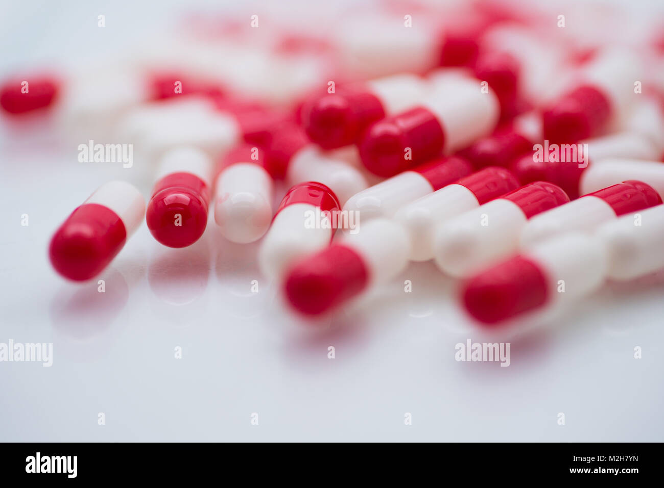 Red generic vitamin pills tablets hi-res stock photography and images -  Alamy