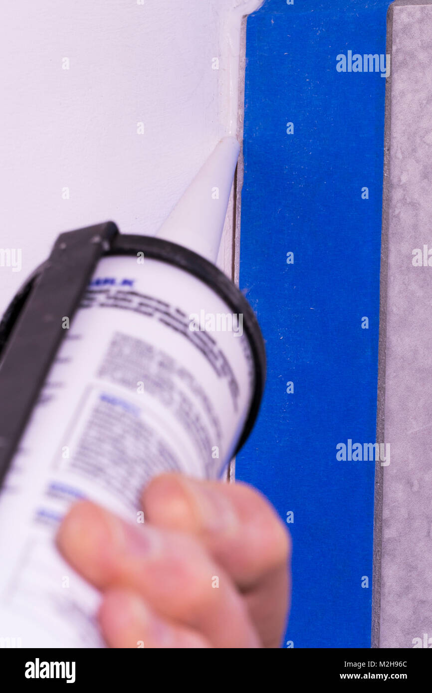 How to hold a sealant gun hires stock photography and images Alamy