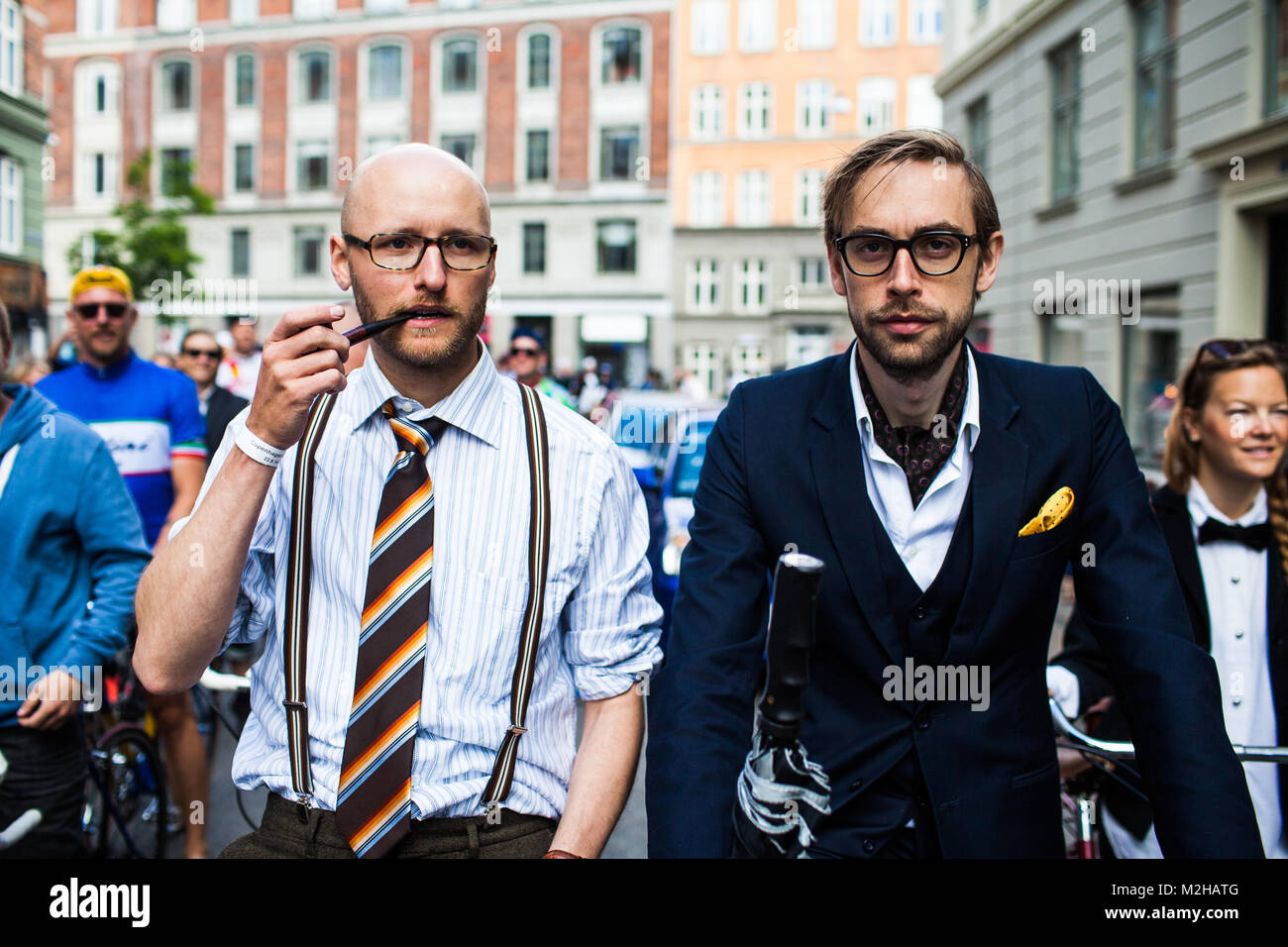 Fashionable cyclers take the Copenhagen Classico classic bike race serious and are dressed up for the occasion. Denmark, 22/06 2014. Stock Photo