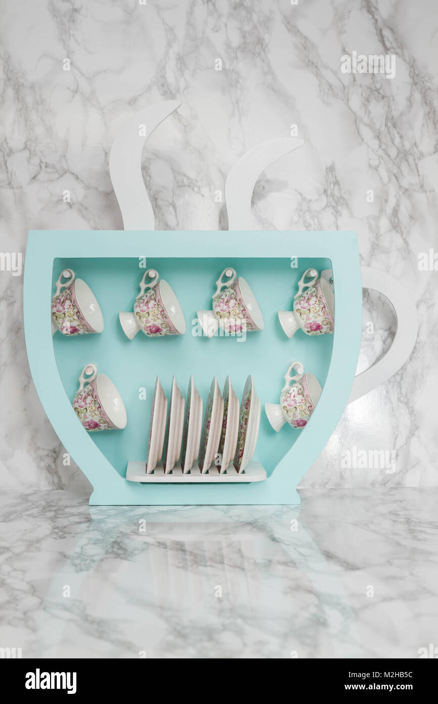 wall shelf hangers on Green Wooden Wall Shelf With Hangers For Coffee Cups On White Stock Photo Alamy