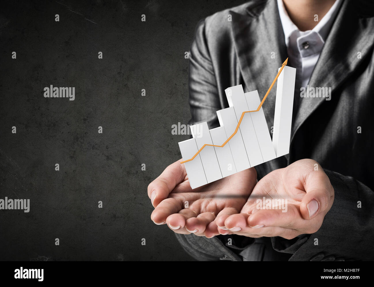 Businessman presenting growing graph Stock Photo - Alamy