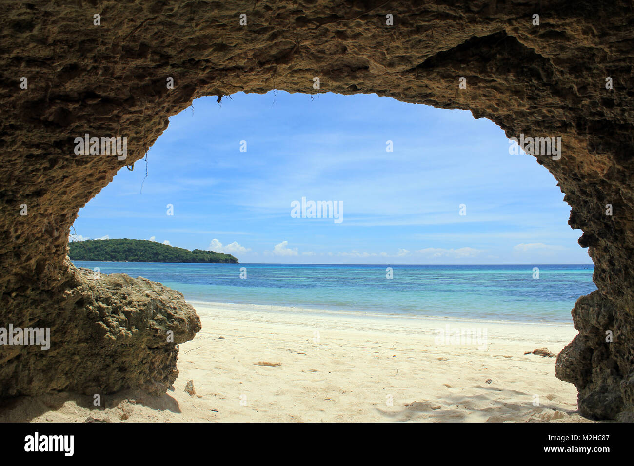 Small Cave as Beachfront Cabana Stock Photo