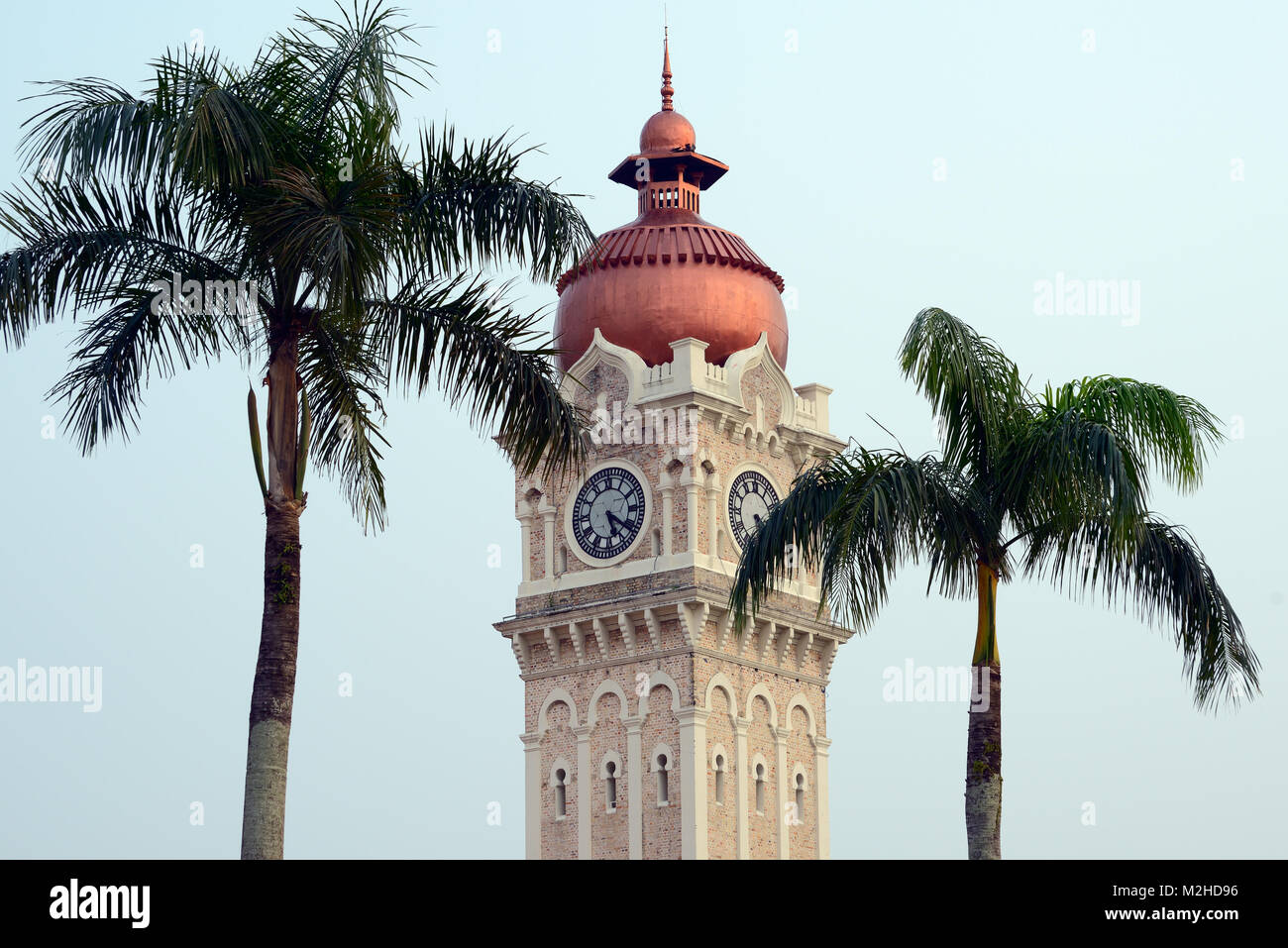 Kuala Lumpur, Malaysia - November 2, 2014: The clock on the 40-meter-high tower of the Palace of the Sultan Abdul Samad closeup Stock Photo