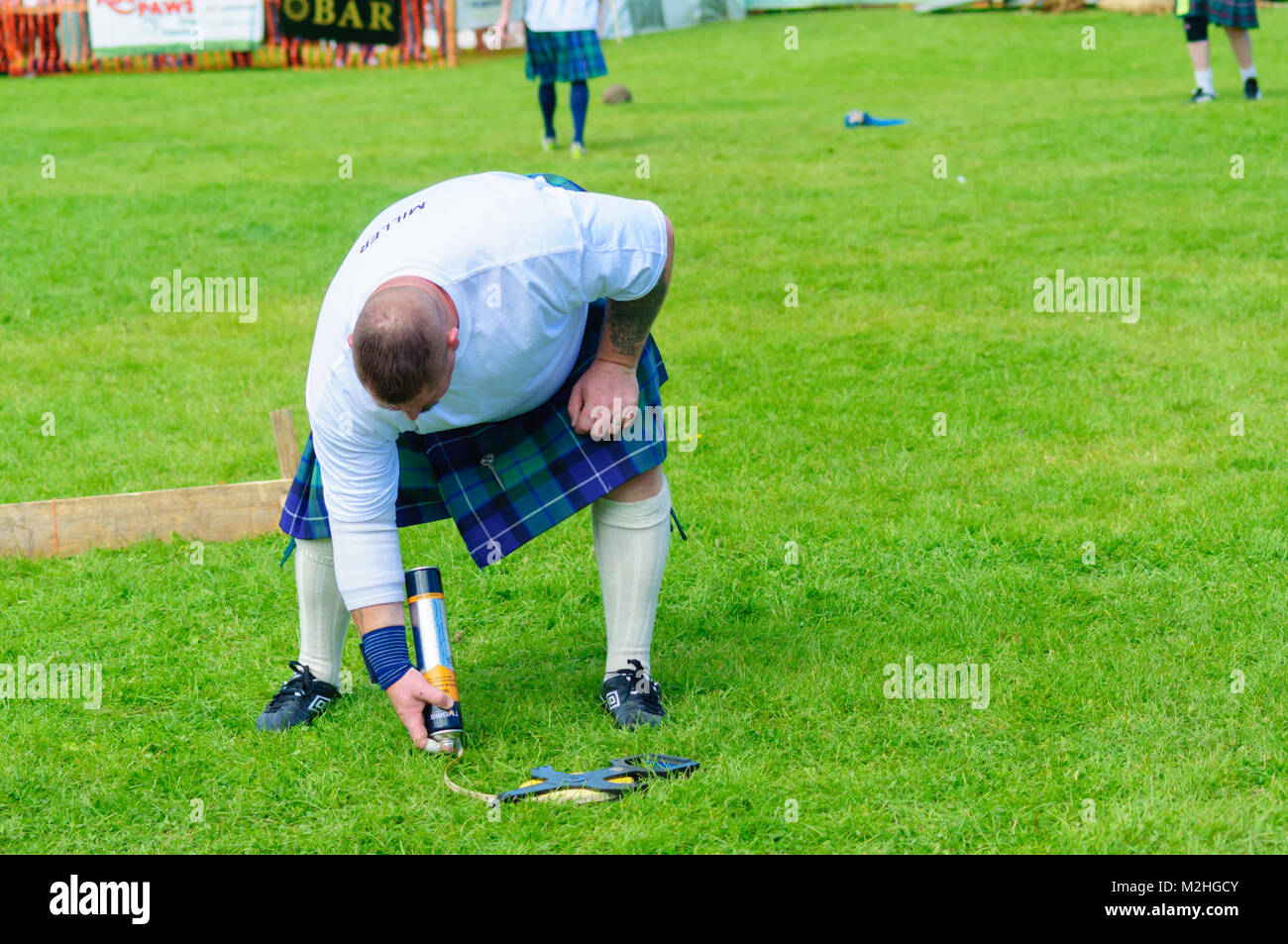 Male competitor preparing to compete in the heavy events at the Dundonald Highland Games, Ayrshire, which celebrates traditional Scottish culture Stock Photo