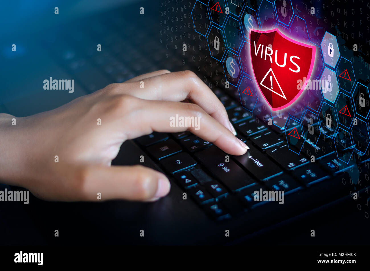 Press enter button on the keyboard computer Protective shield virus red Exclamation Warning Caution Computer in dark with word virus Stock Photo