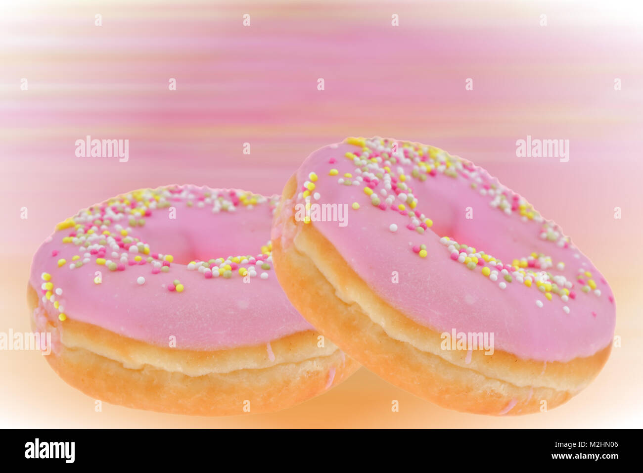 Donuts are the most wonderful sweet you can imagine for a second breakfast. Stock Photo