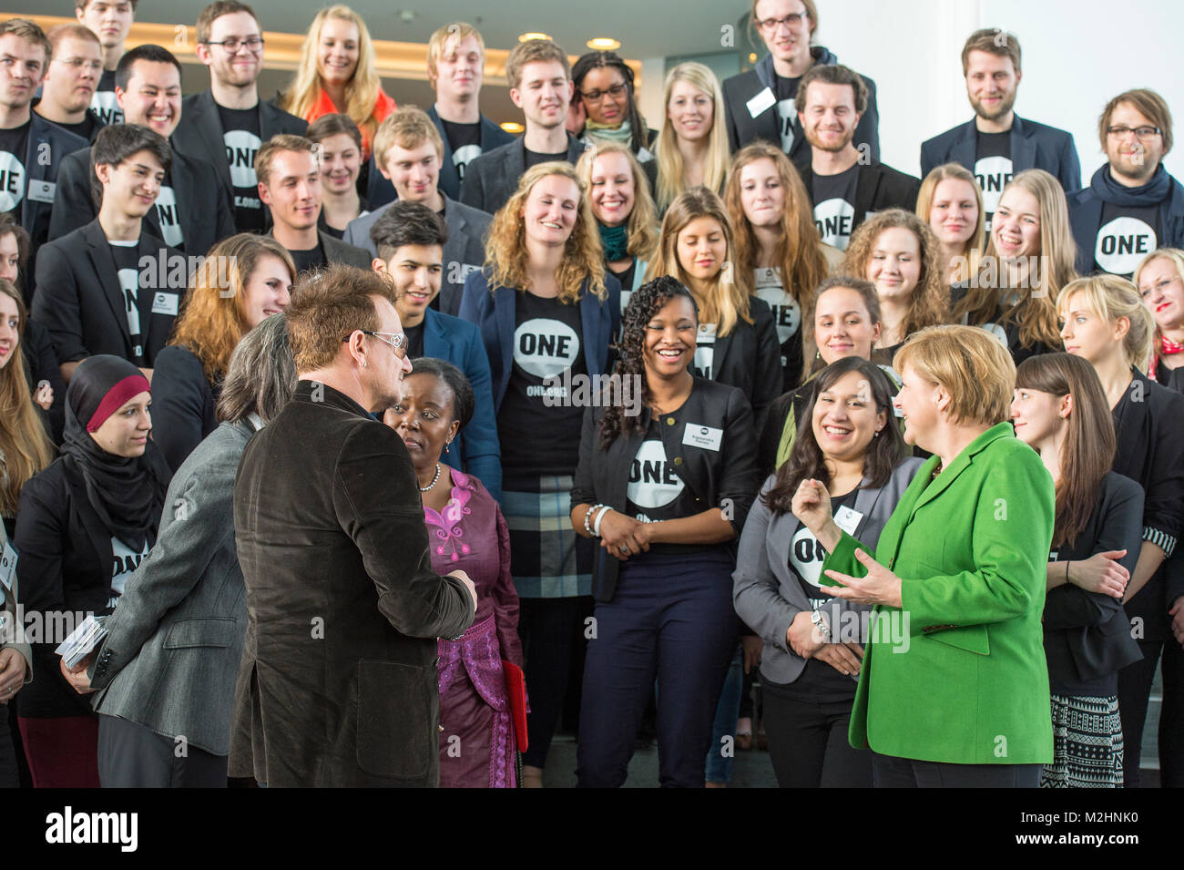 German Chancellor Angela Merkel receives the Youth Ambassadors of the development organization ONE.  ONE engages primarily in cooperation in Africa. The Youth Ambassadors will be accompanied by the vocalist of the band U2 Bono Vox (Paul David Hewson), founder of the organization. Stock Photo