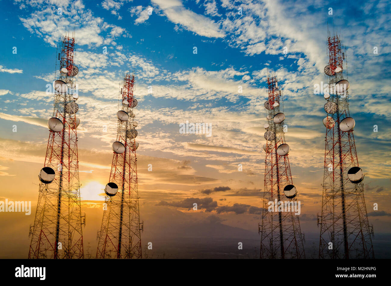 Telecommunication tower antenna in morning sky Evening sky Stock Photo