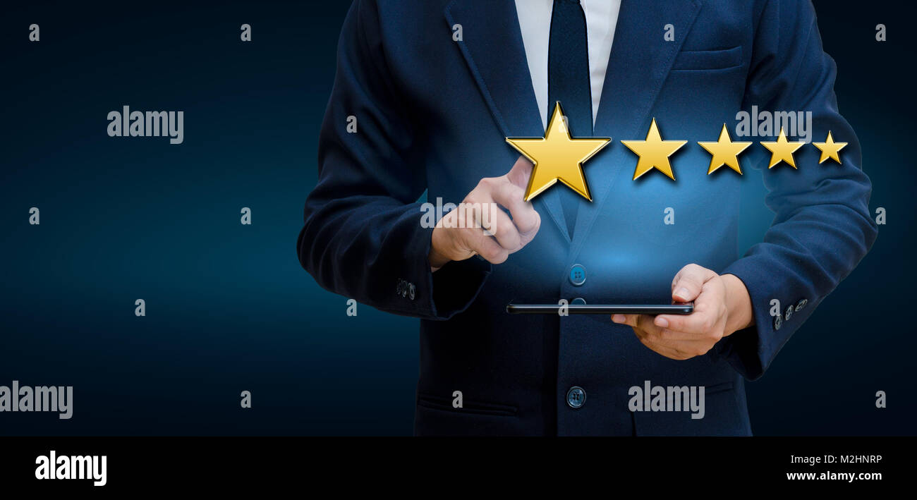 Businessmen pointing five star stars to boost corporate ratings Phone Holder Stock Photo