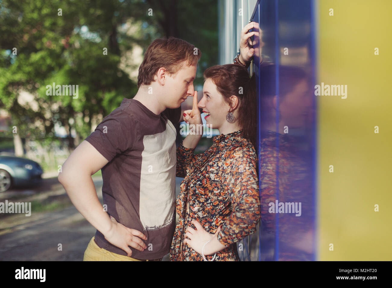 Young happy loving couple having fun and enjoying in park Stock Photo ...