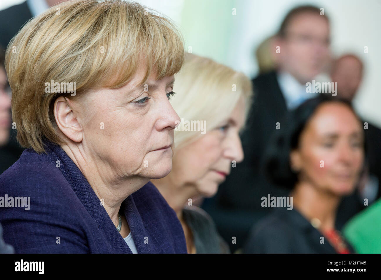 German Chancellor Angela Merkel delivers the awards to the 'Young Scientist' in the federal Chancellery. Stock Photo
