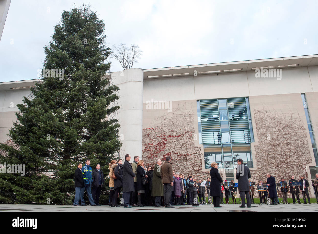 Federal Chancellor Angela Merkel and Minister Ronald Pofalla  do official opening to the christmas lighting the lightes of the Christmas tree at the chancellery. Stock Photo