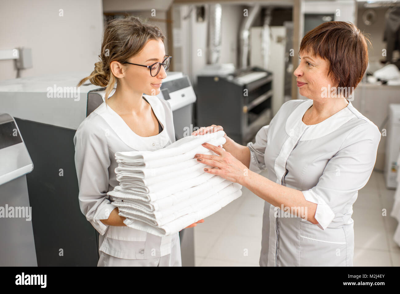 Laundry assistant hires stock photography and images Alamy