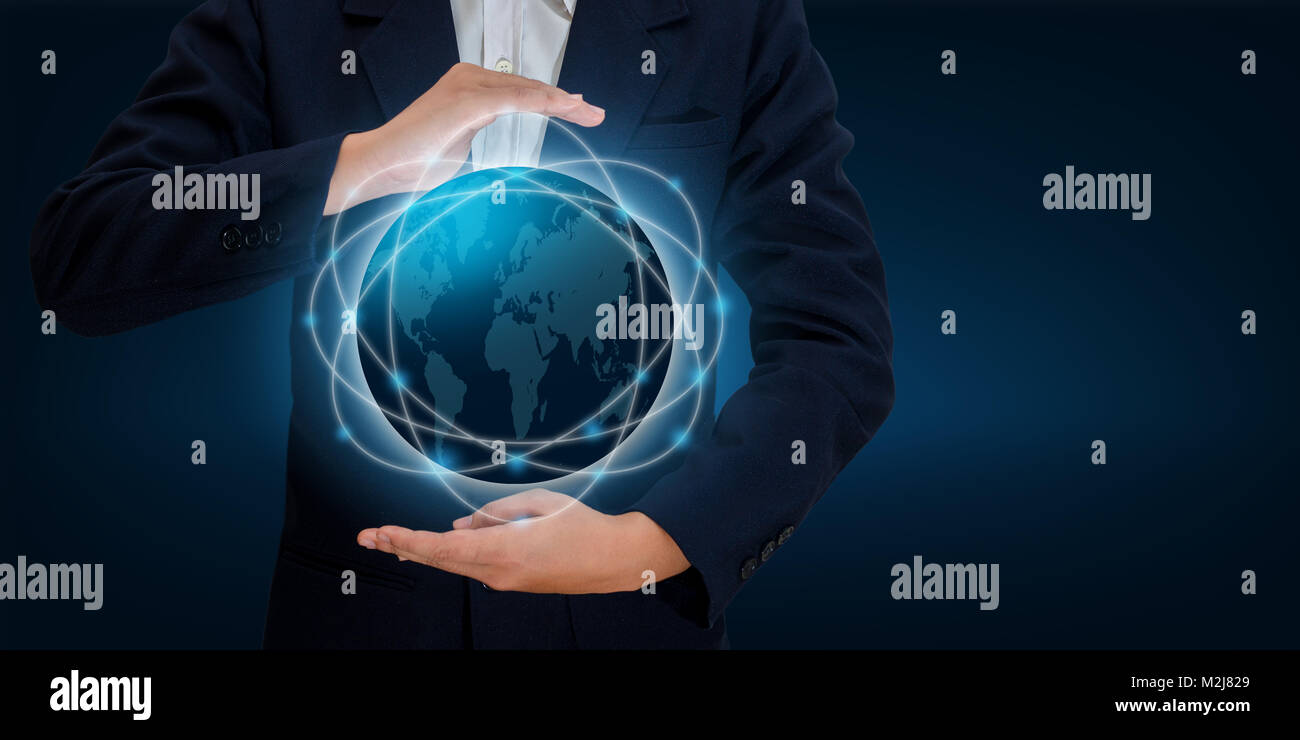 World Map In the hands of a businessman network technology and communication Space input data Stock Photo