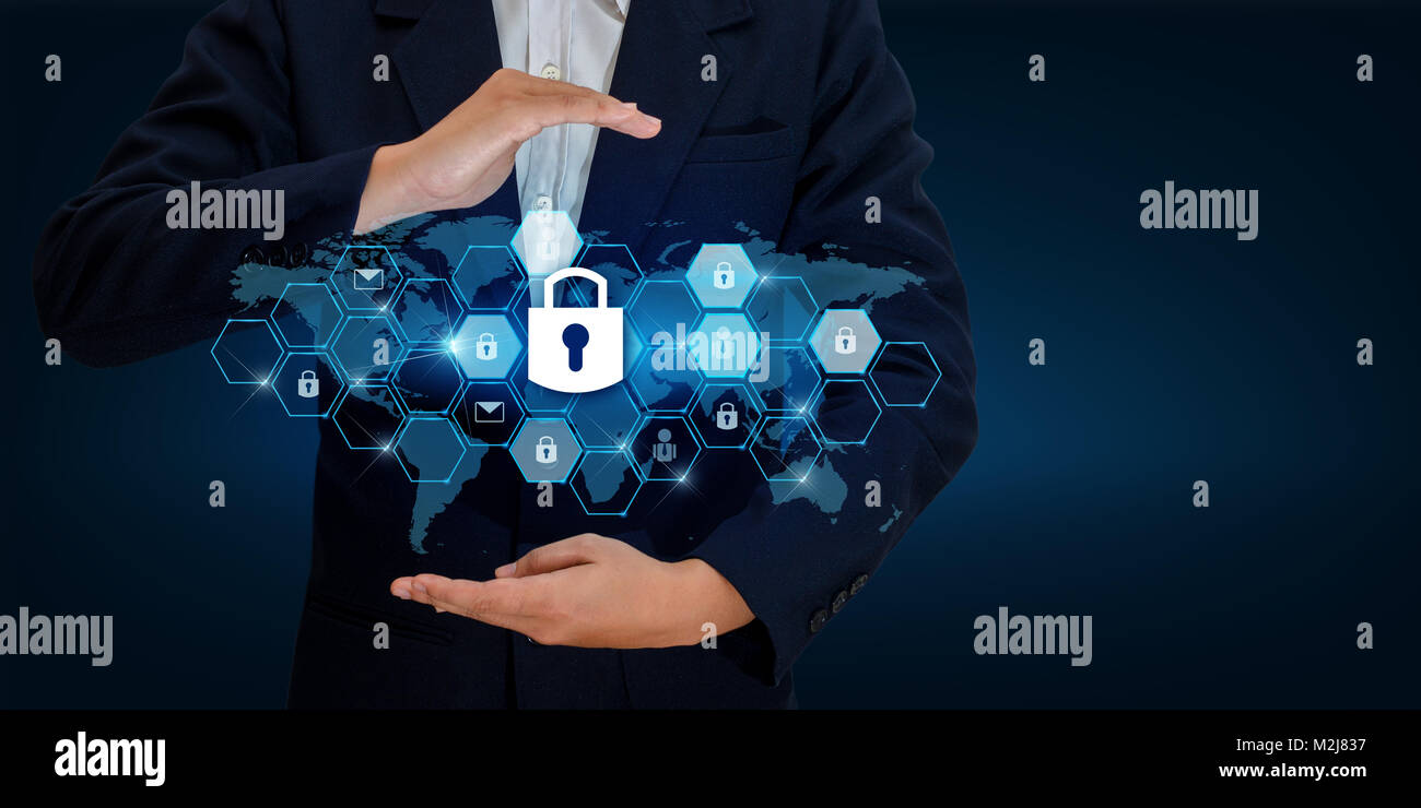 lock In the hands of a businessman Shield the shield to protect the cyberspace.Space input data Data Security Business Internet Concept. Secure inform Stock Photo